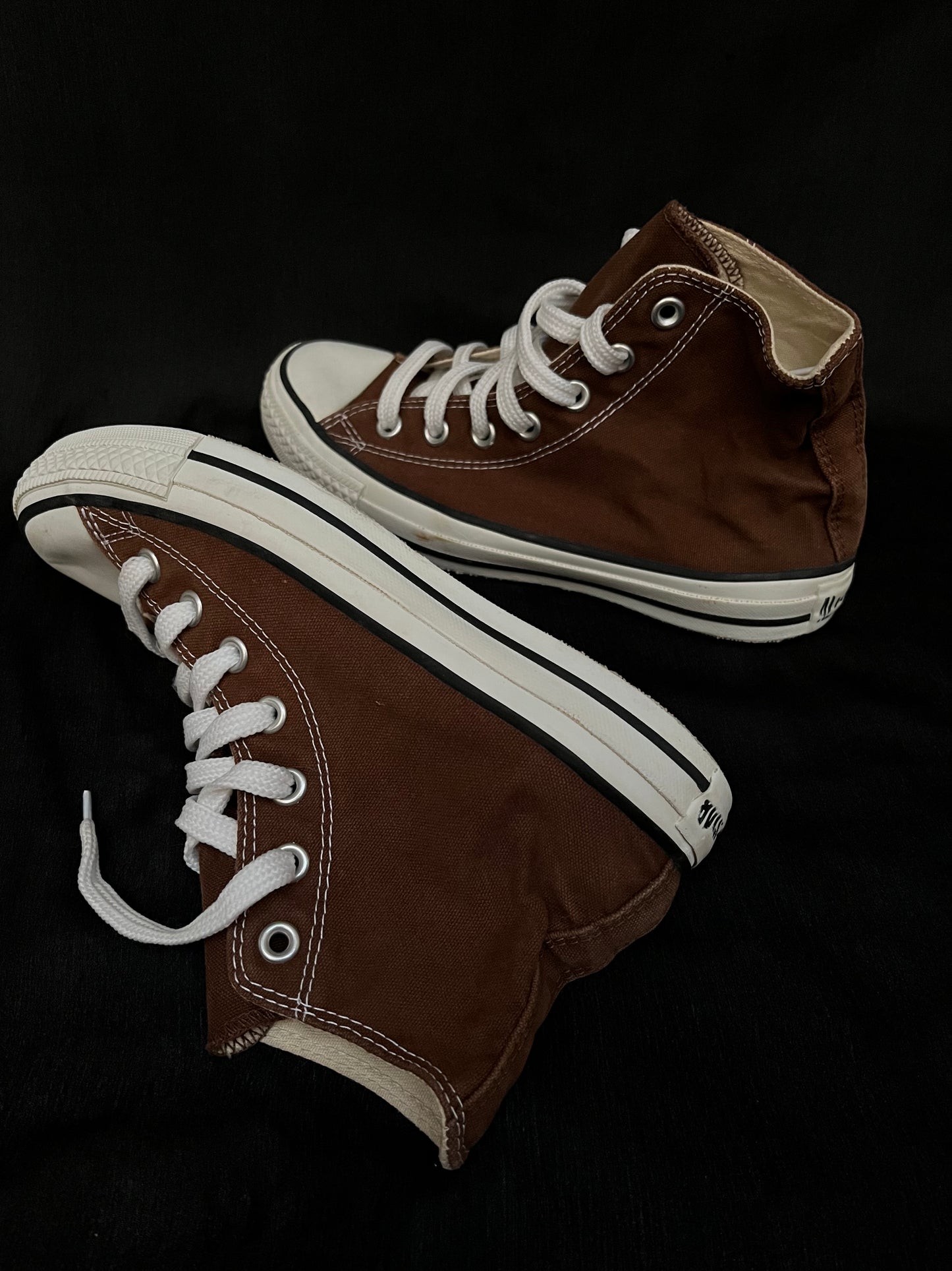 Brown hightop converse