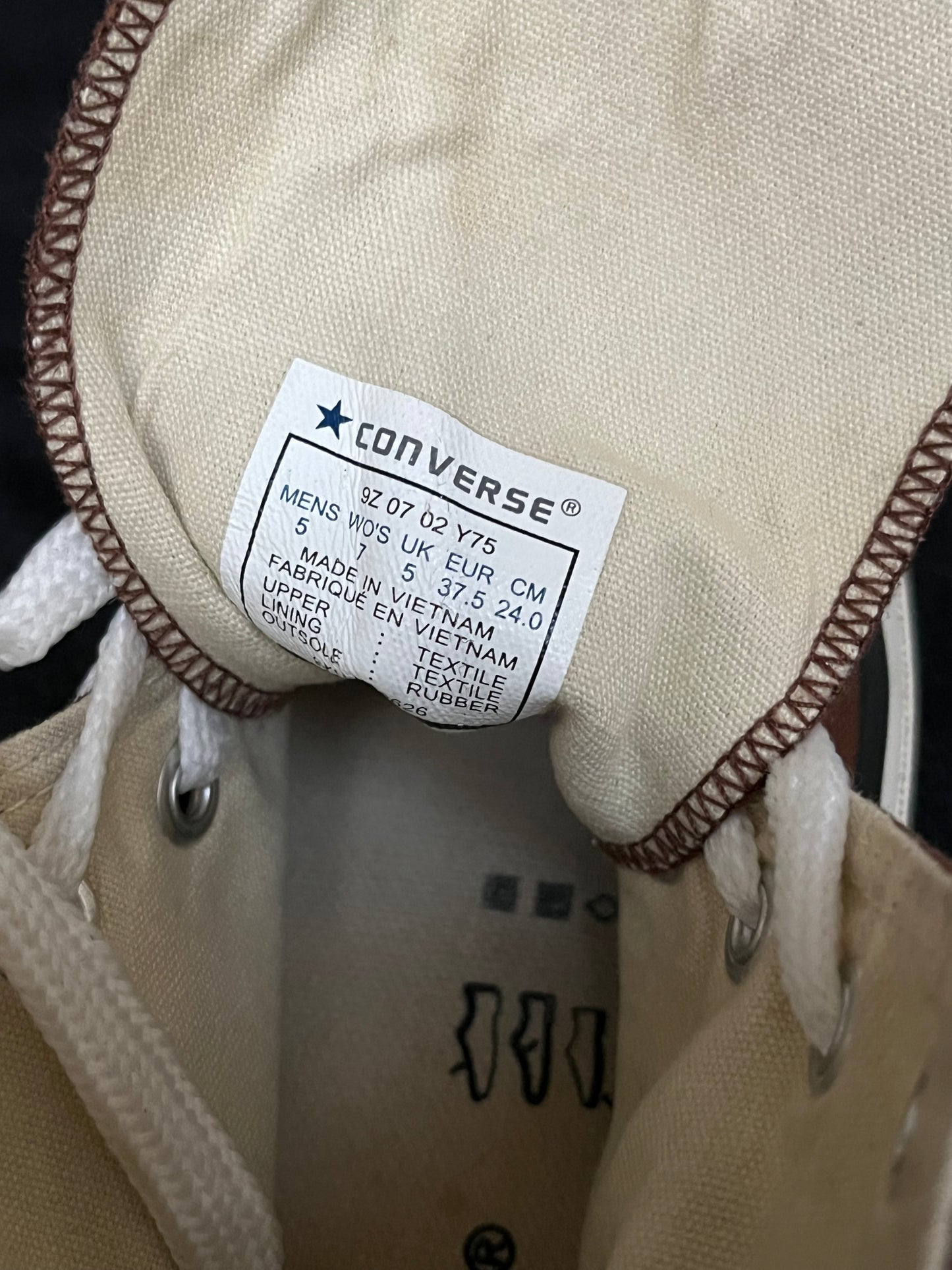 Brown hightop converse