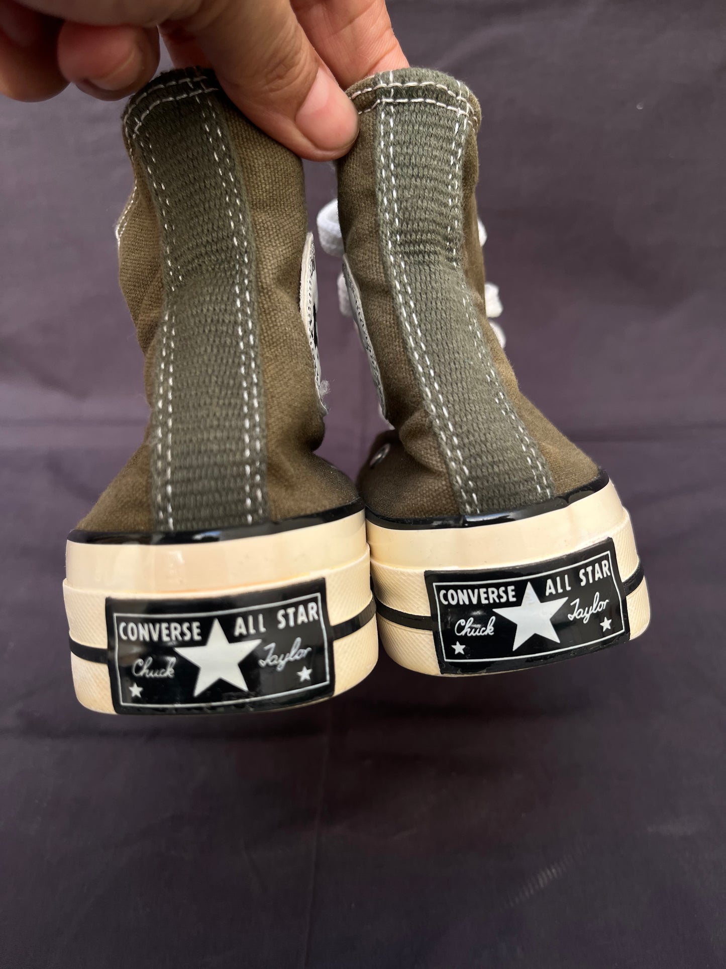 Olive green Chuck Taylor hightop