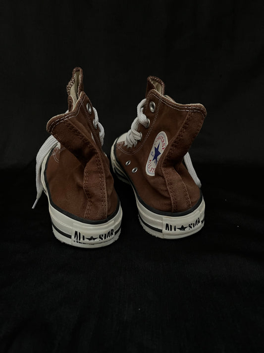 Brown hightop converse