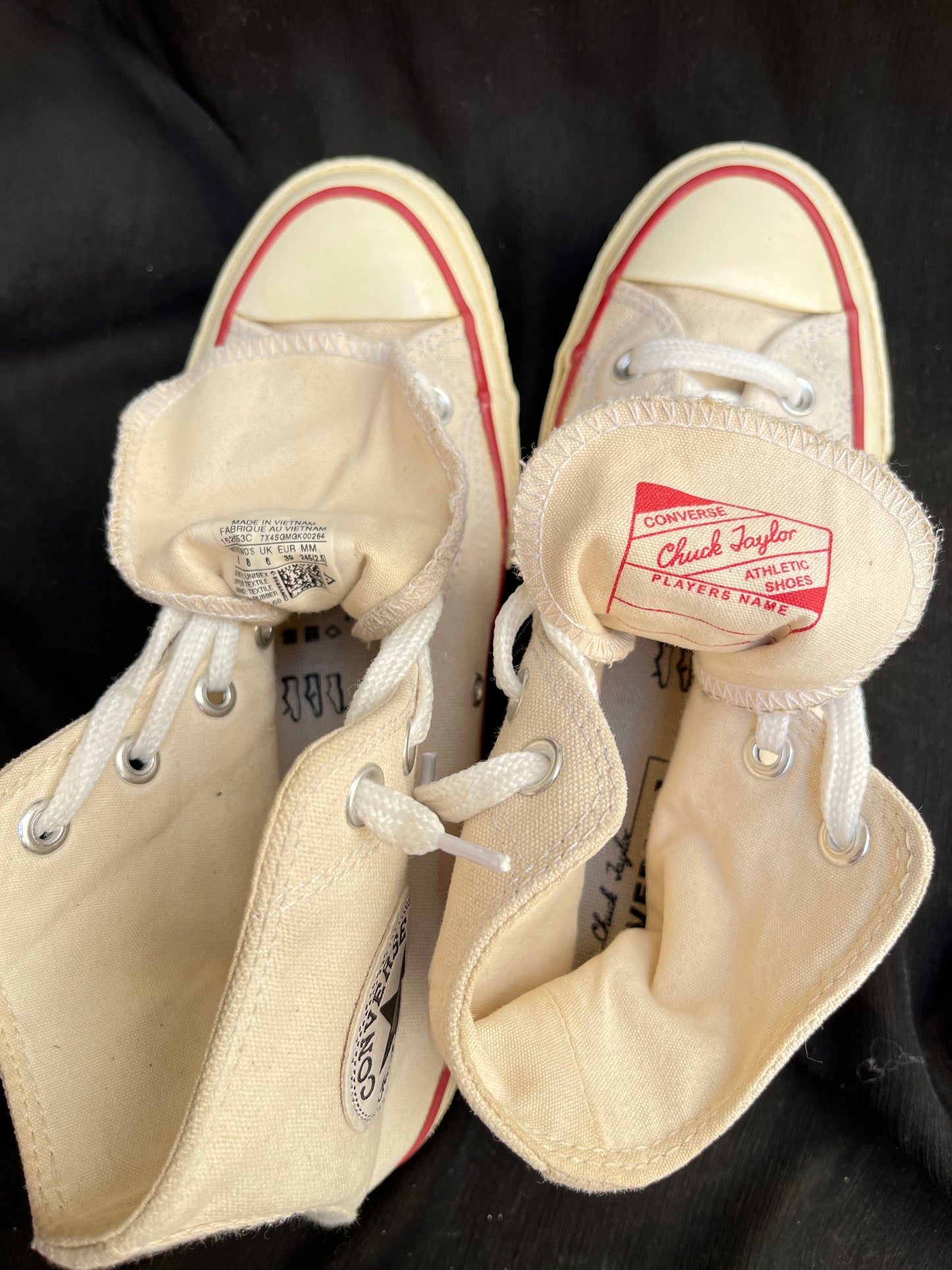 Beige hightop converse 37