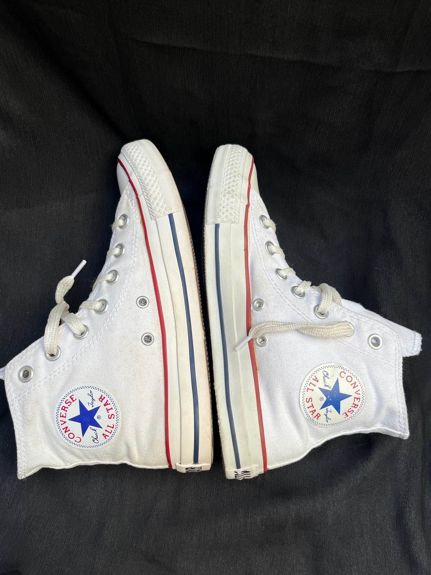 White hightop converse