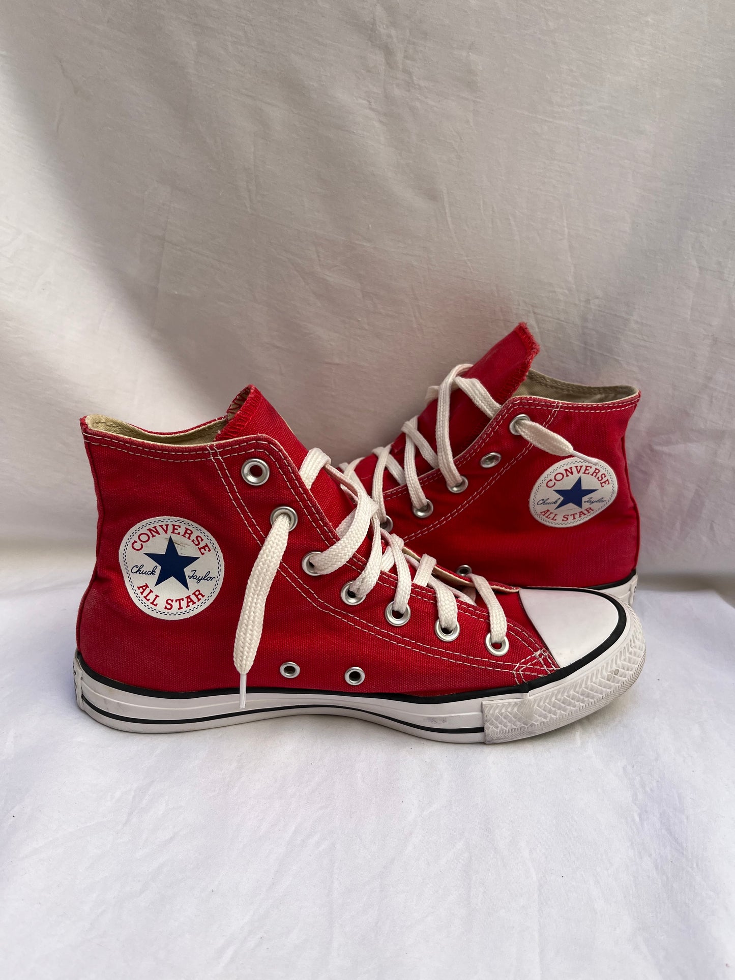 Red hightop converse