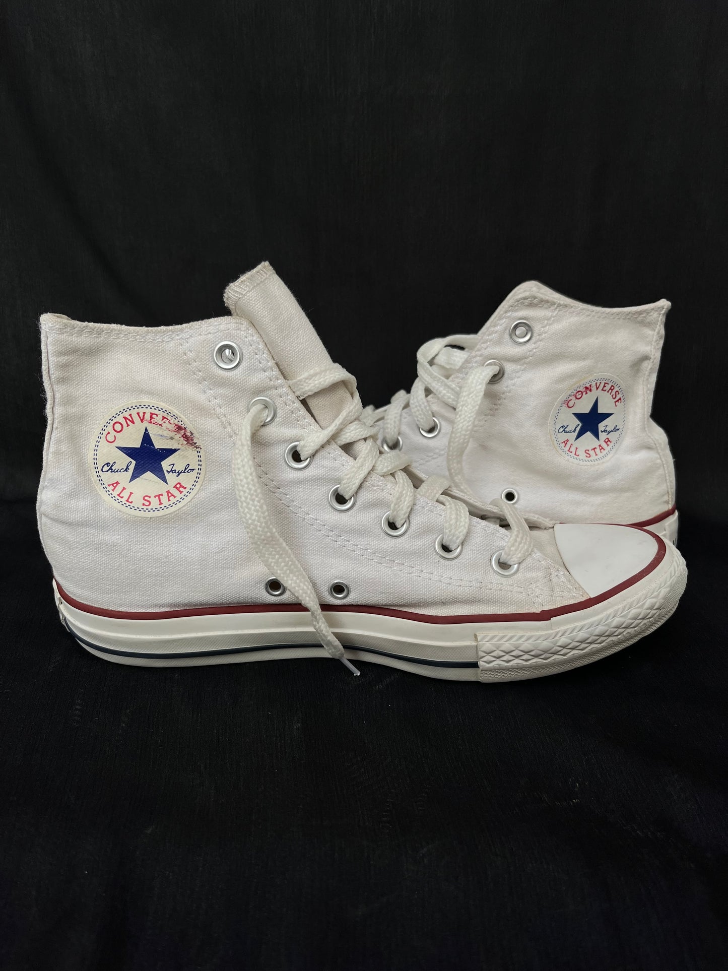White hightop converse