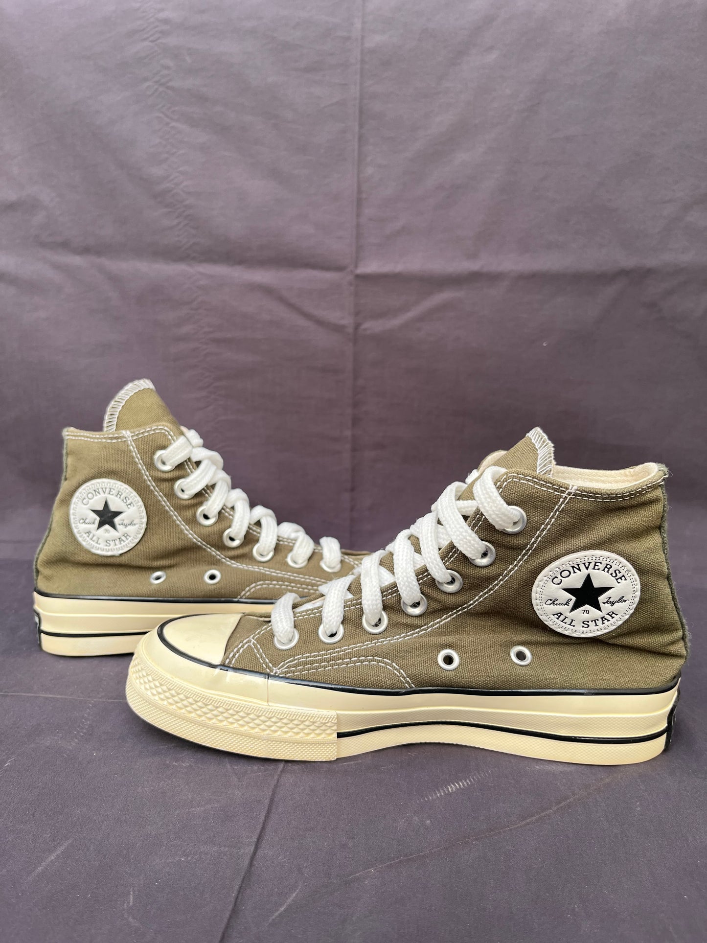 Olive green Chuck Taylor hightop