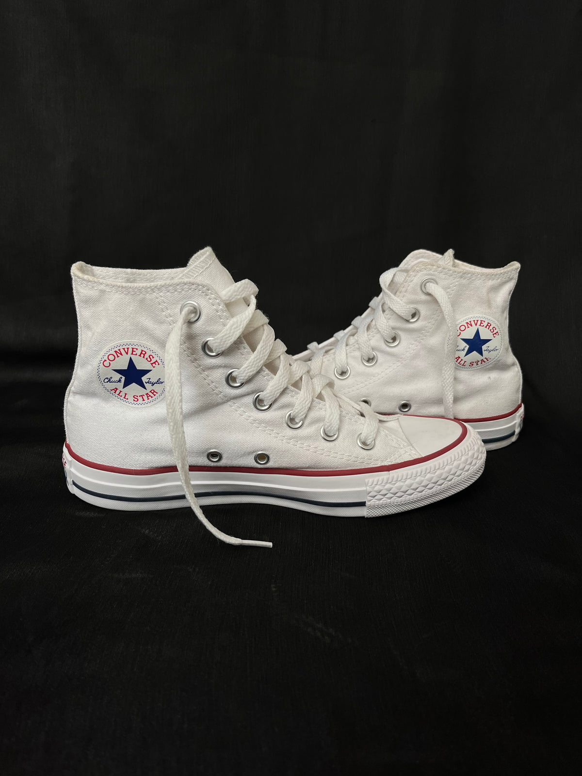 White hightop converse