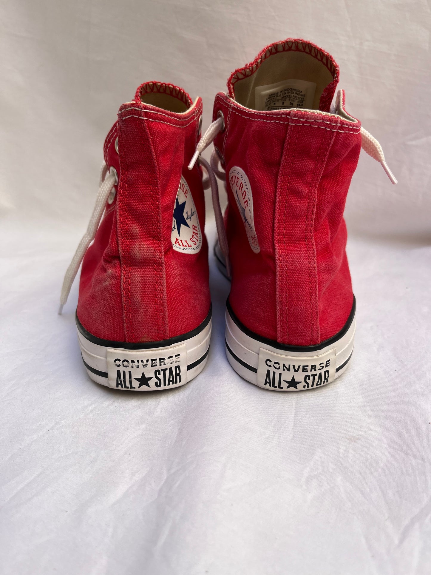 Red hightop converse