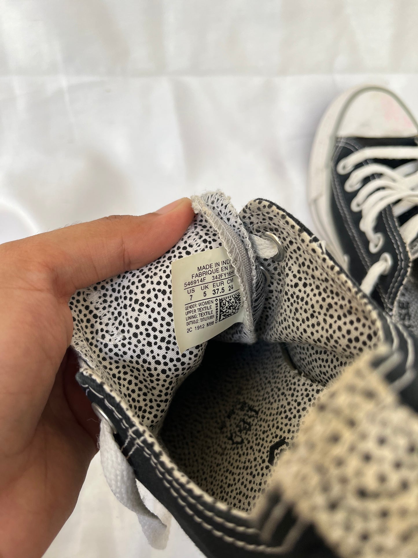 Special edition doted black lowtop converse