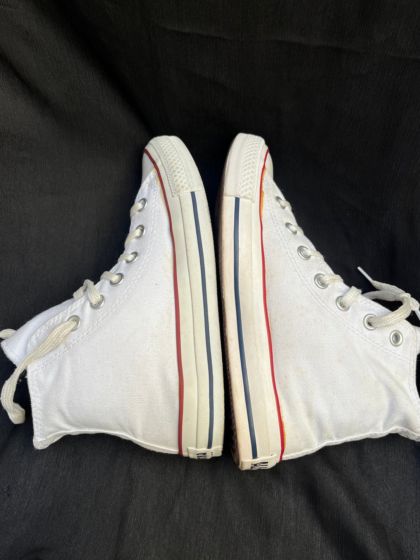 White hightop converse