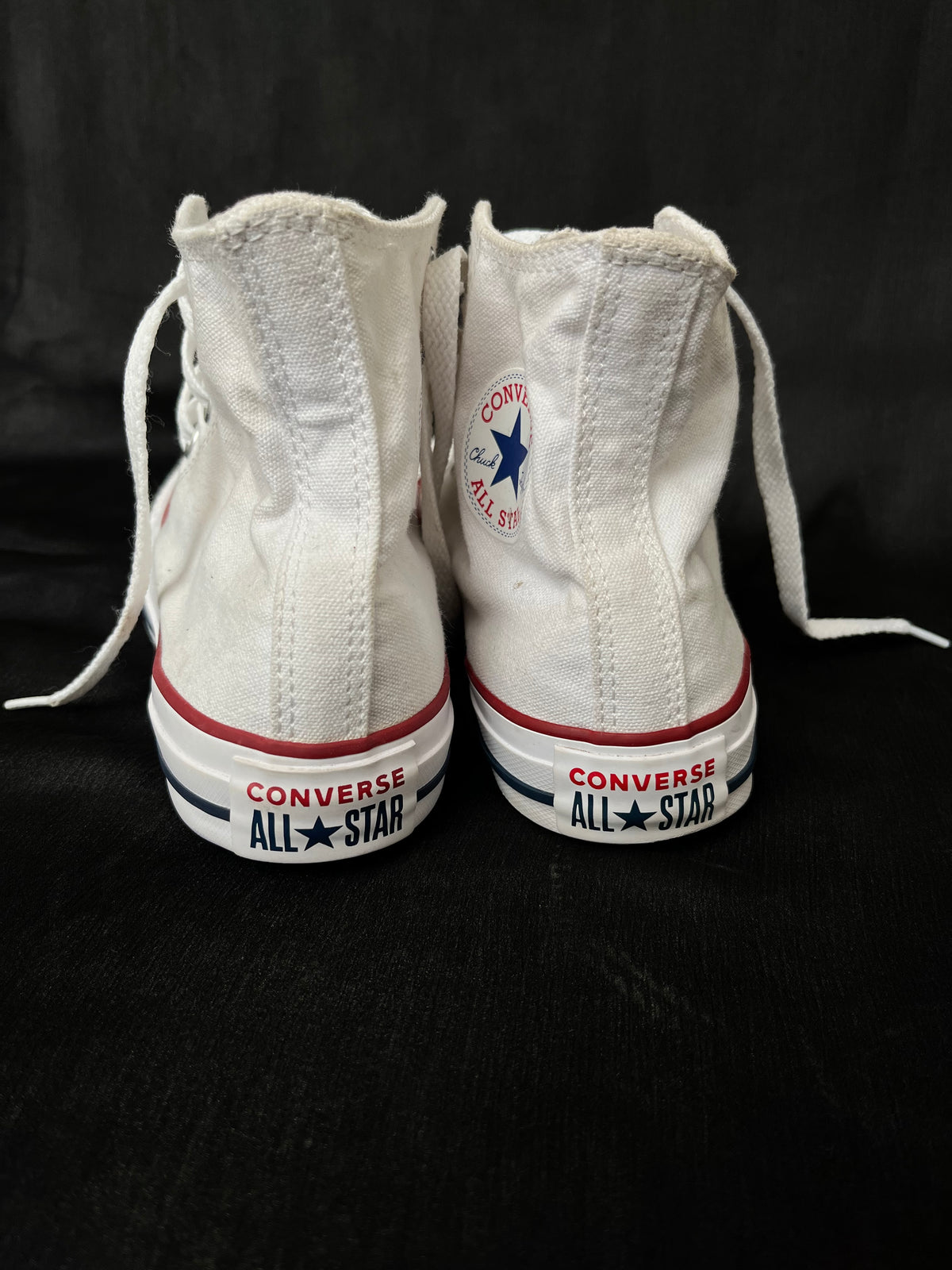 White hightop converse
