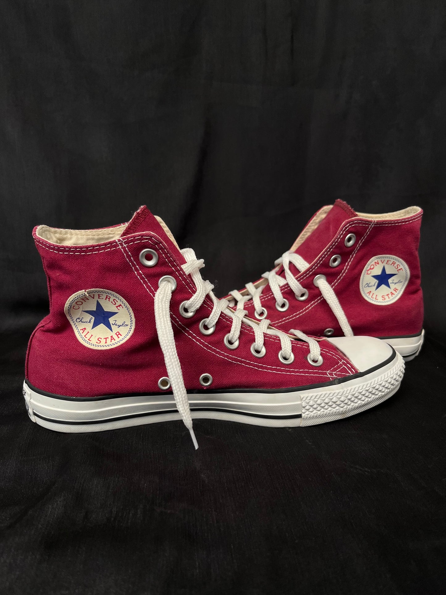 Maroon hightop converse