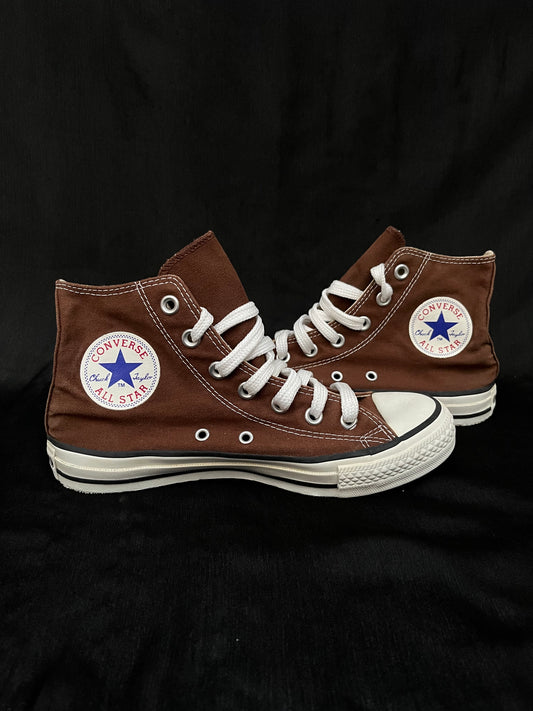 Brown hightop converse