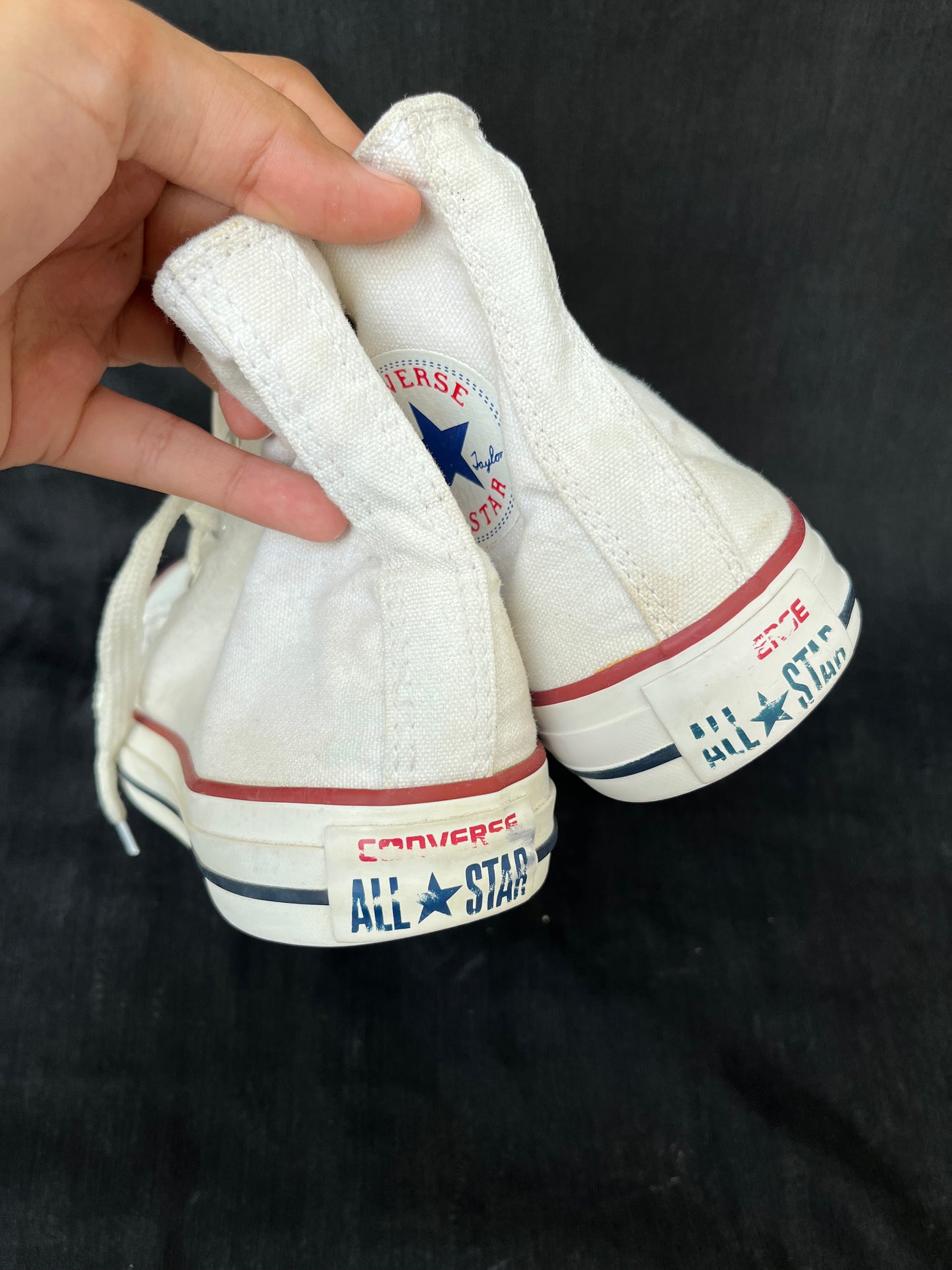 White hightop converse
